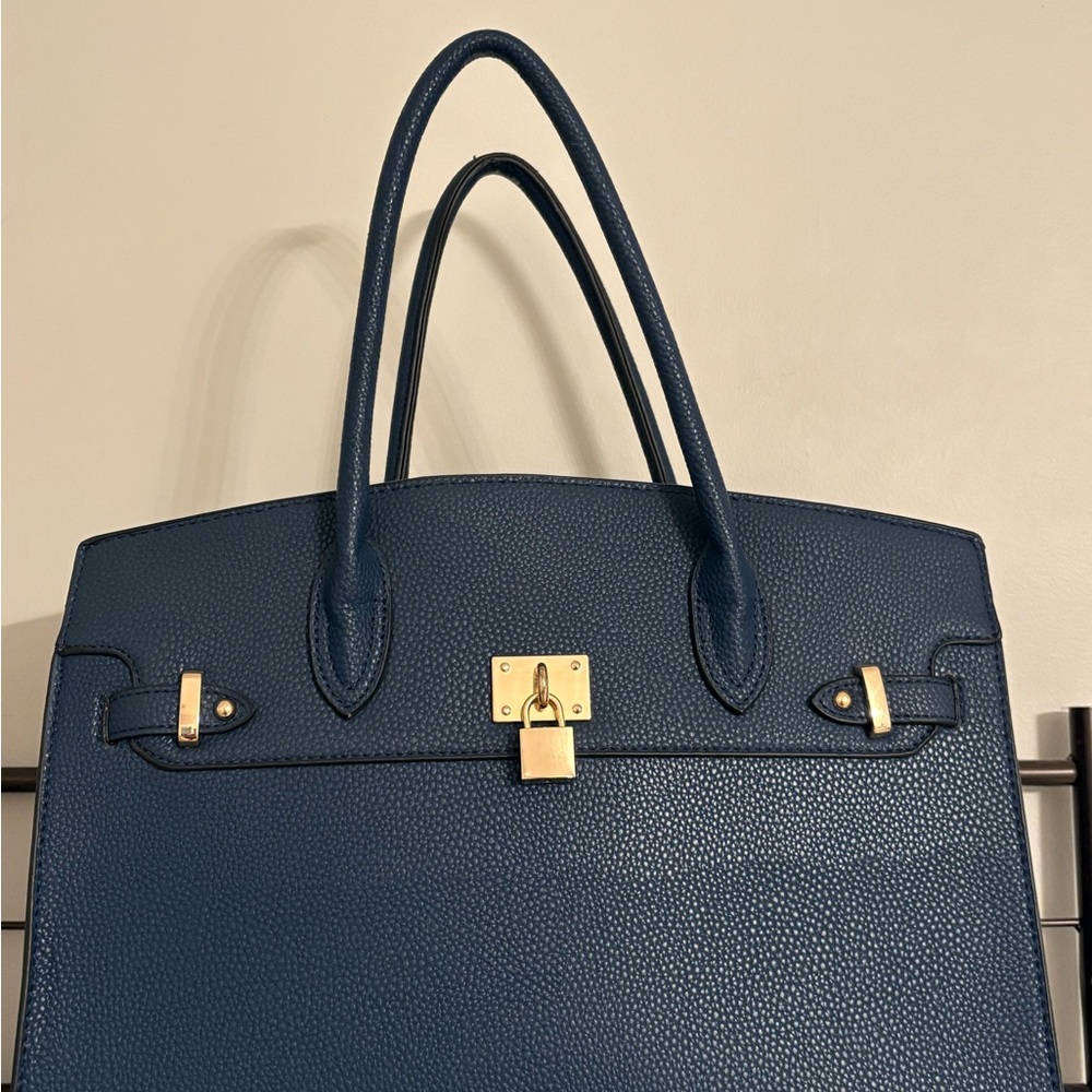 Elegant Blue Handbag with Gold Accents